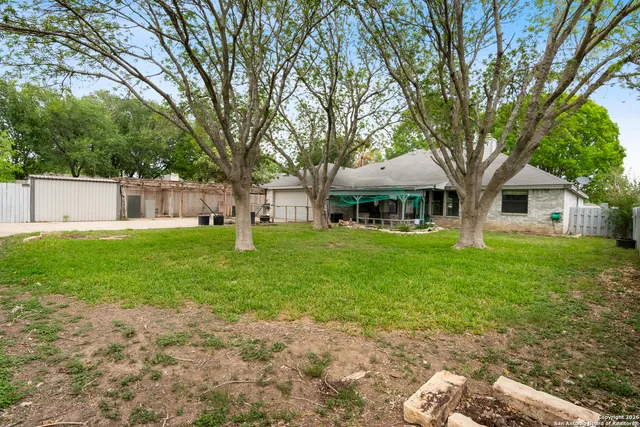 a view of a house with garden