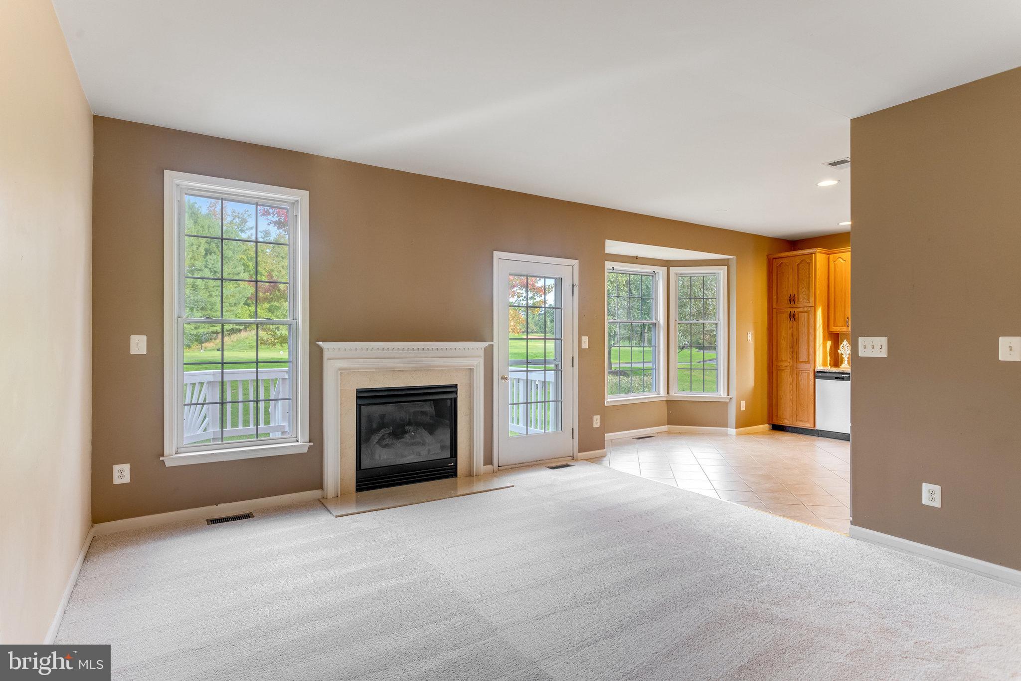5608 Wheelwright Way Haymarket, VA 20169 - Photo 14 of 88 Family room open to kitchen