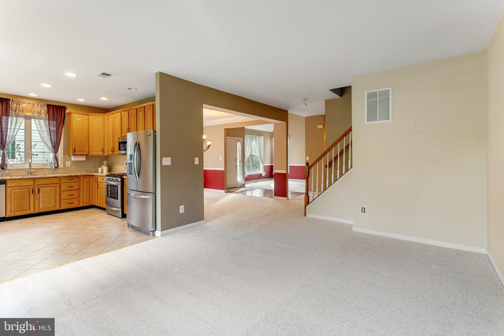 5608 Wheelwright Way Haymarket, VA 20169 - Photo 15 of 88 Family room view of staircase