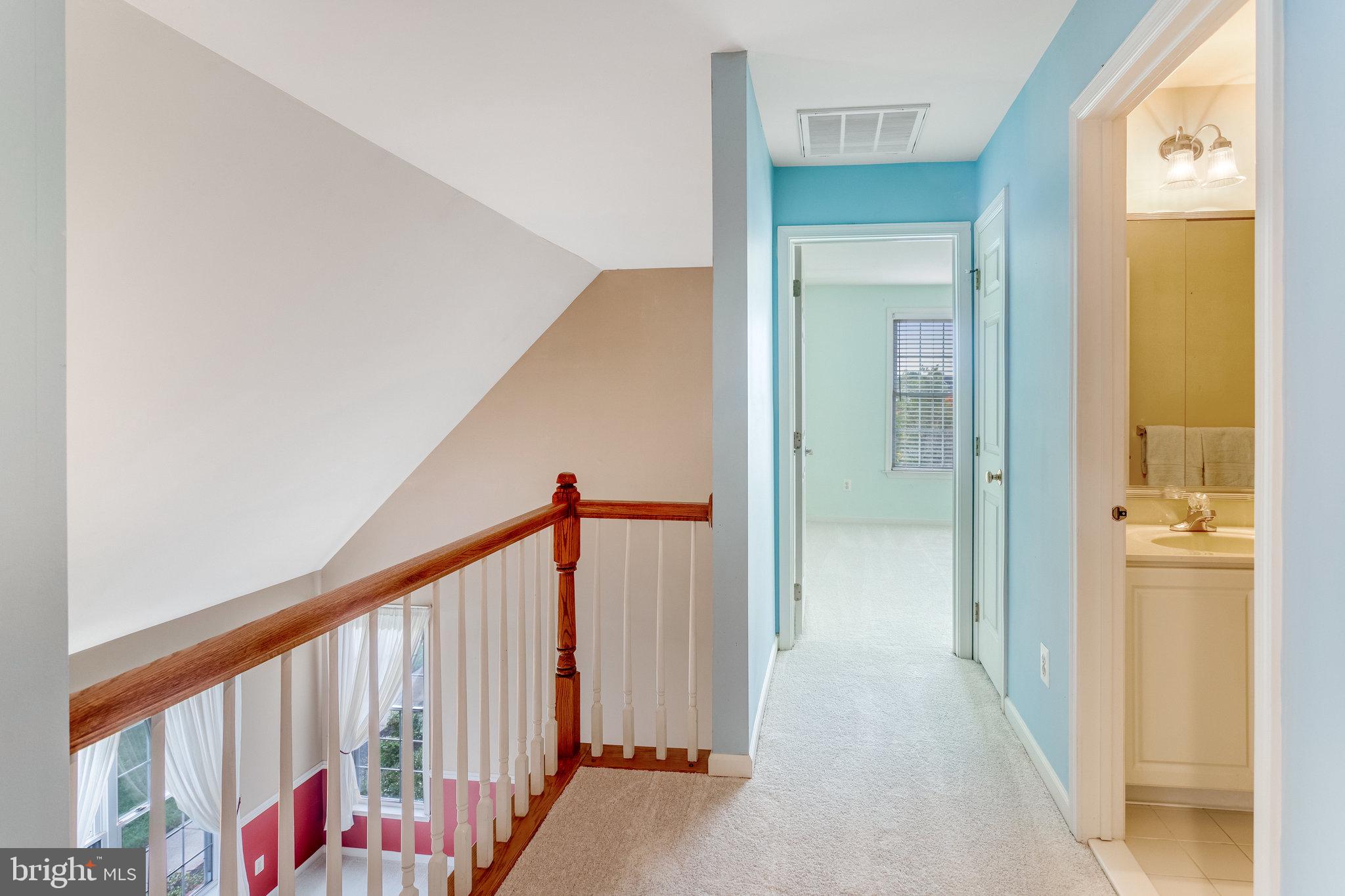 5608 Wheelwright Way Haymarket, VA 20169 - Photo 26 of 88 Hallway overlooks main level