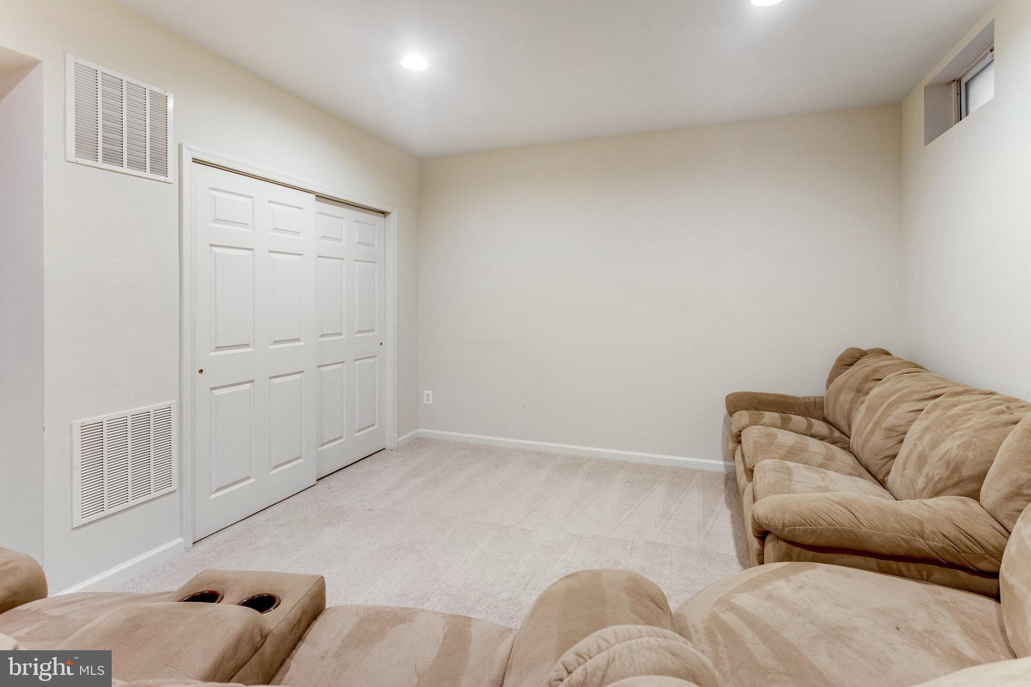 5608 Wheelwright Way Haymarket, VA 20169 - Photo 34 of 88 Lower level family room