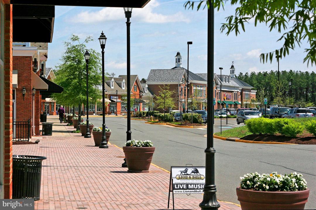 5608 Wheelwright Way Haymarket, VA 20169 - Photo 85 of 88 Wide brick paver sidewalks in shopping center