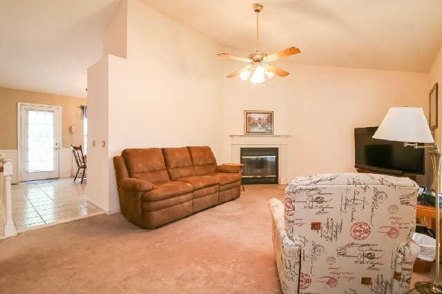 3509 Country Way Road Antioch, TN 37013 - Photo 3 of 7 a living room with furniture a fireplace and a flat screen tv