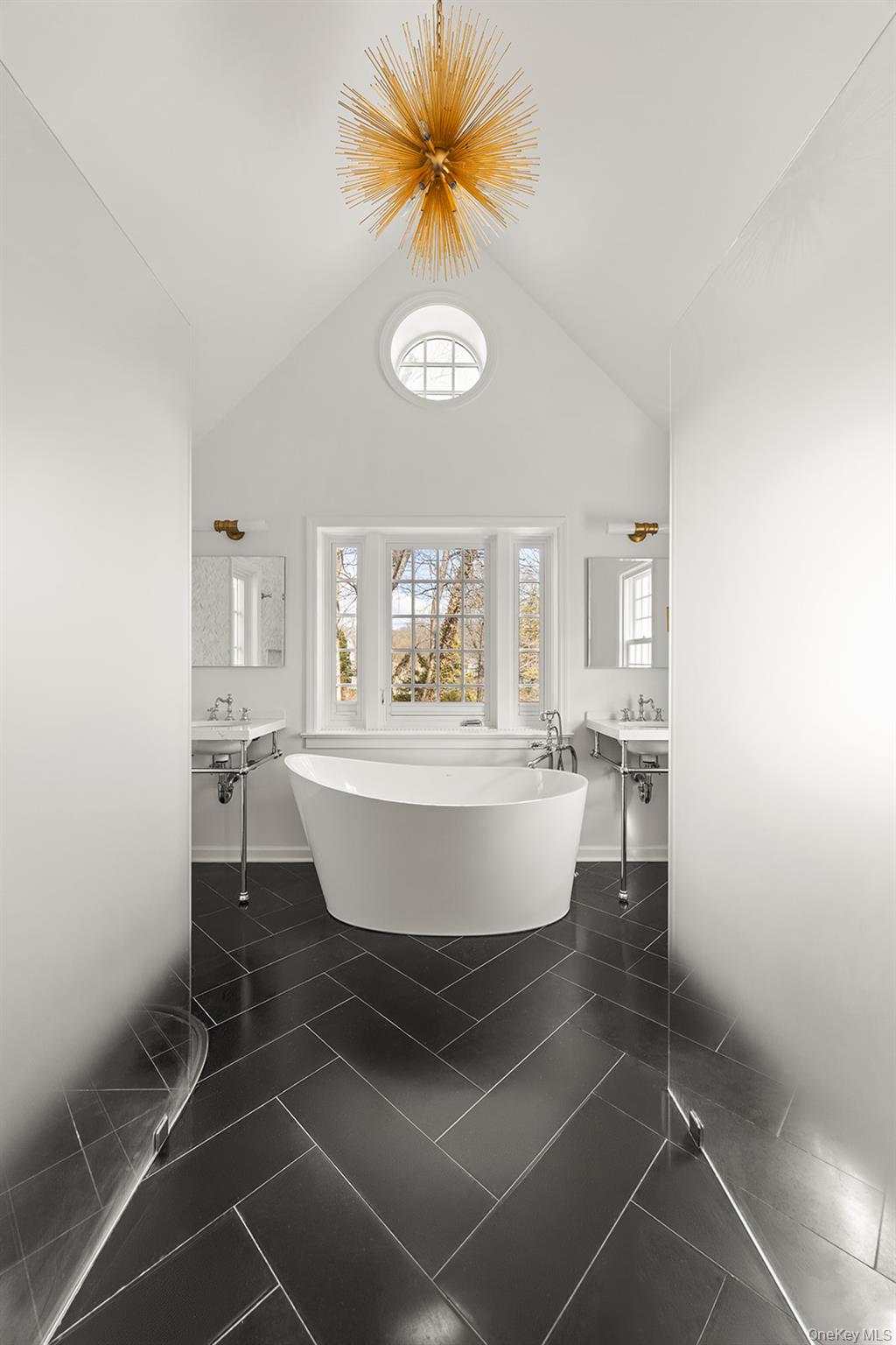 147 Valley Stream Road East Larchmont, NY 10538 - Photo 14 of 37 a view of a room with a dining table and chairs