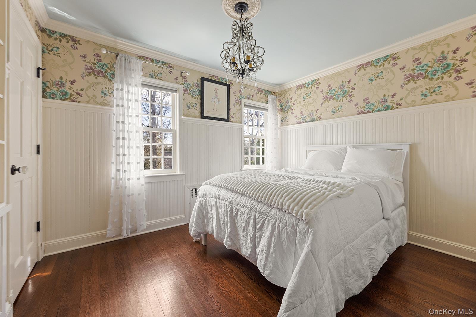 147 Valley Stream Road East Larchmont, NY 10538 - Photo 16 of 37 a bedroom with a large bed and a window