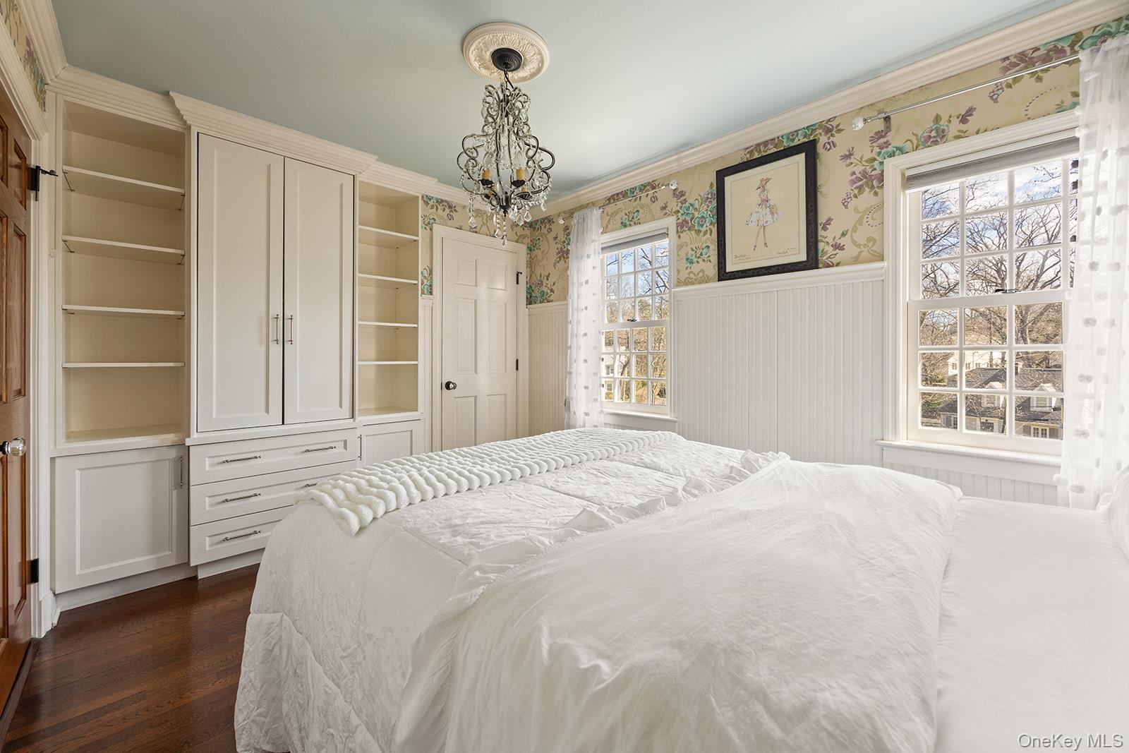 147 Valley Stream Road East Larchmont, NY 10538 - Photo 17 of 37 a bedroom with a large bed and a window