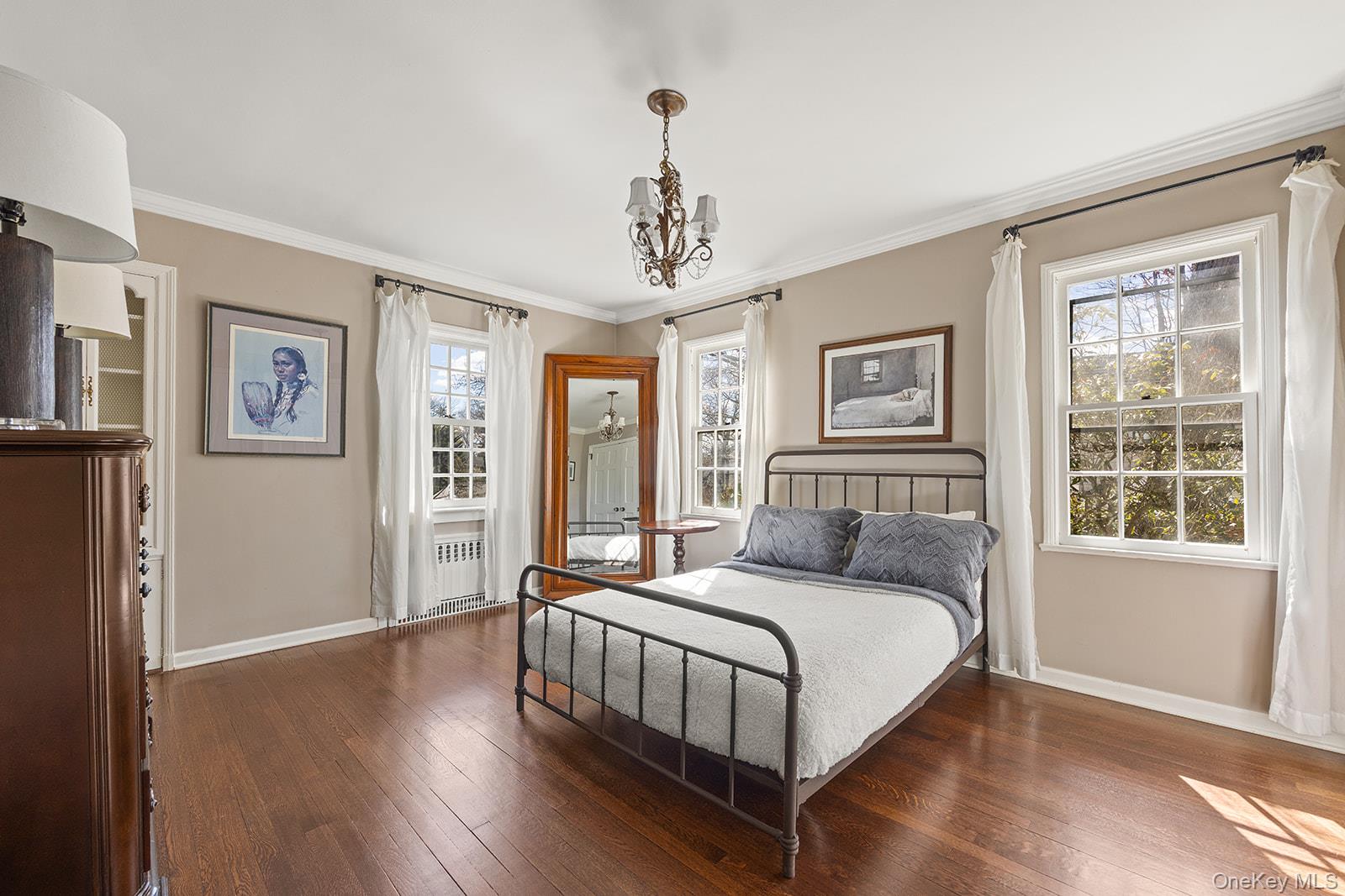 147 Valley Stream Road East Larchmont, NY 10538 - Photo 19 of 37 a bedroom with a large bed and a window