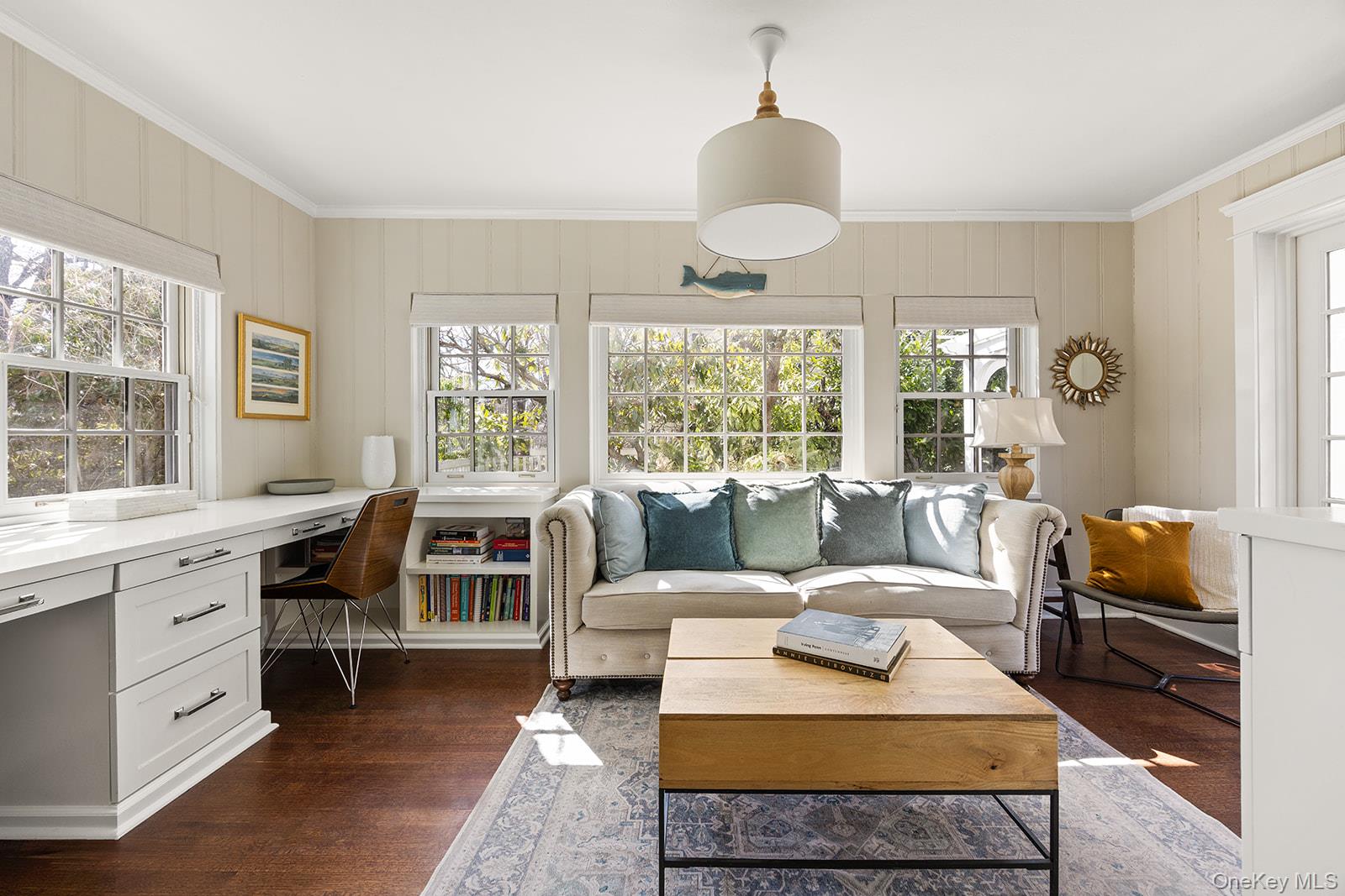 147 Valley Stream Road East Larchmont, NY 10538 - Photo 2 of 37 a living room with furniture fireplace and a large window