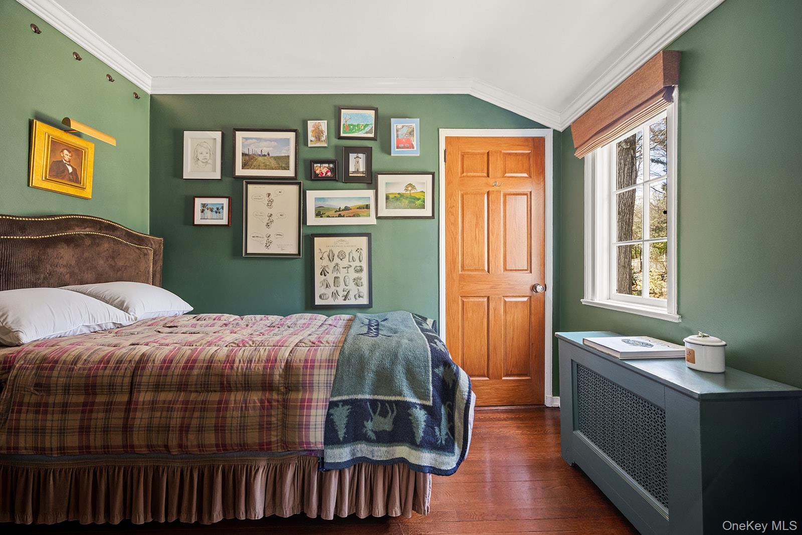 147 Valley Stream Road East Larchmont, NY 10538 - Photo 22 of 37 a bedroom with a bed and a window