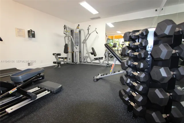 a view of a room with gym equipment