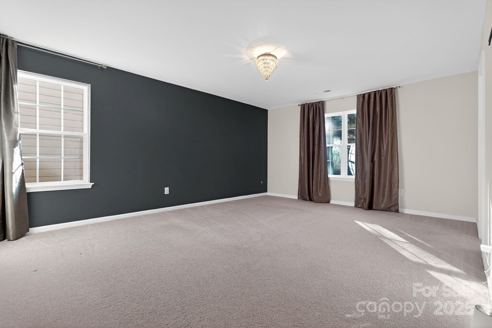 130 Dry Rivers Lane Mooresville, NC 28117 - Photo 11 of 30 a view of an empty room with a window