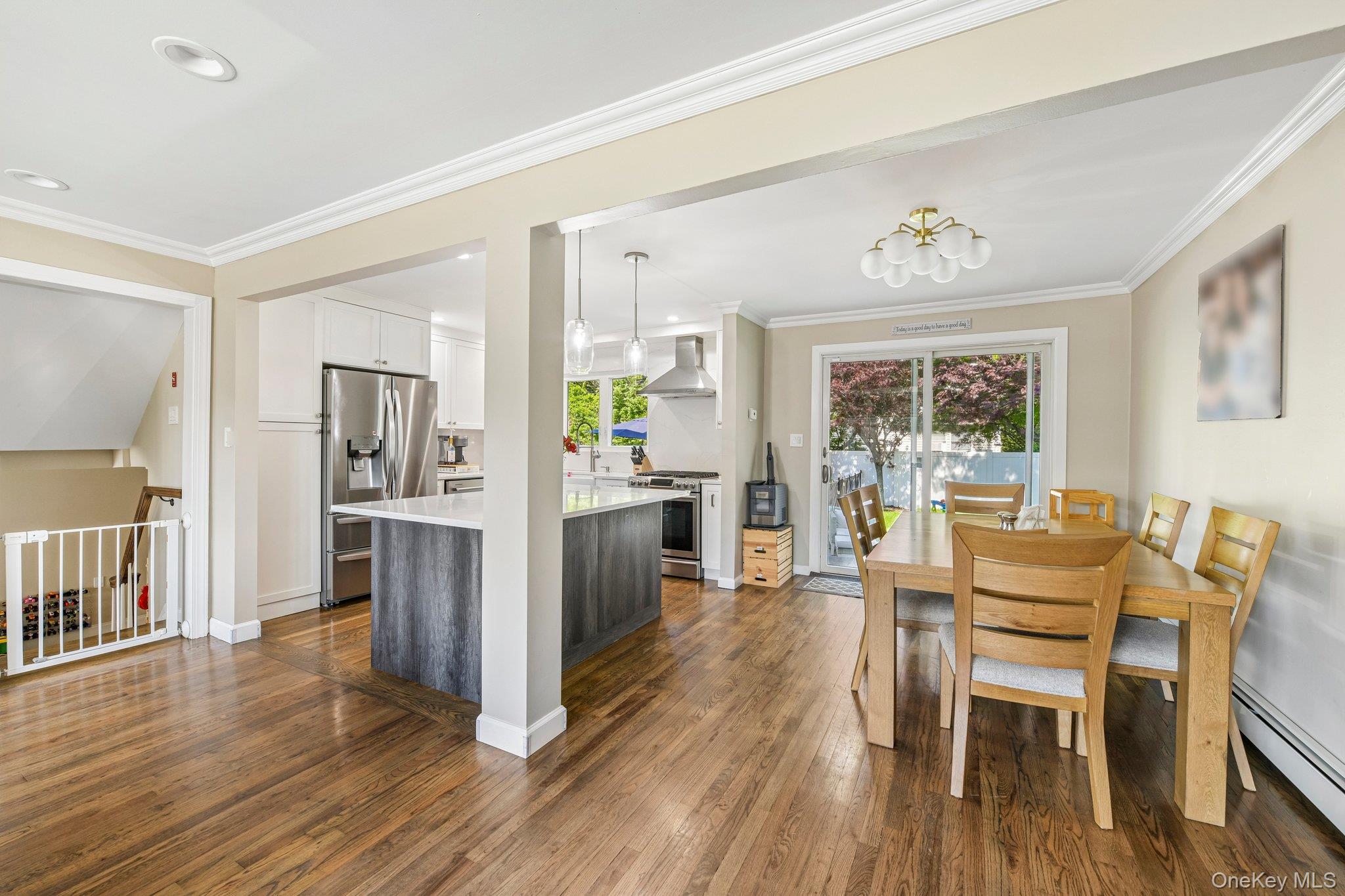 2821 Colonial Avenue Merrick, NY 11566 - Photo 6 of 29 a view of a dining room with furniture and wooden floor