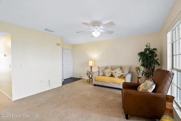 a backyard of a house with seating space