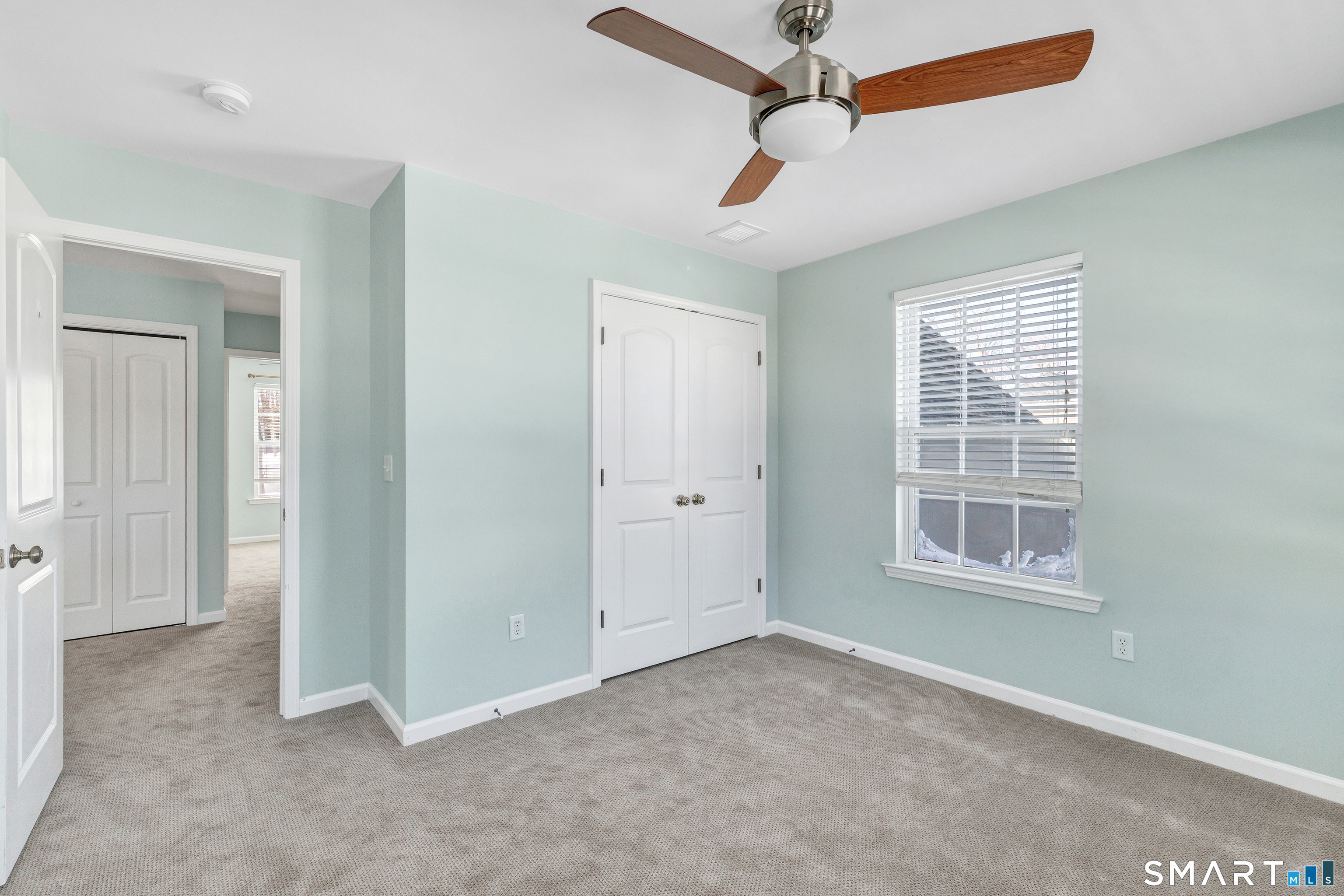 9 Fox Run Lane Seymour, CT 06483 - Photo 27 of 39 an empty room with windows and fan
