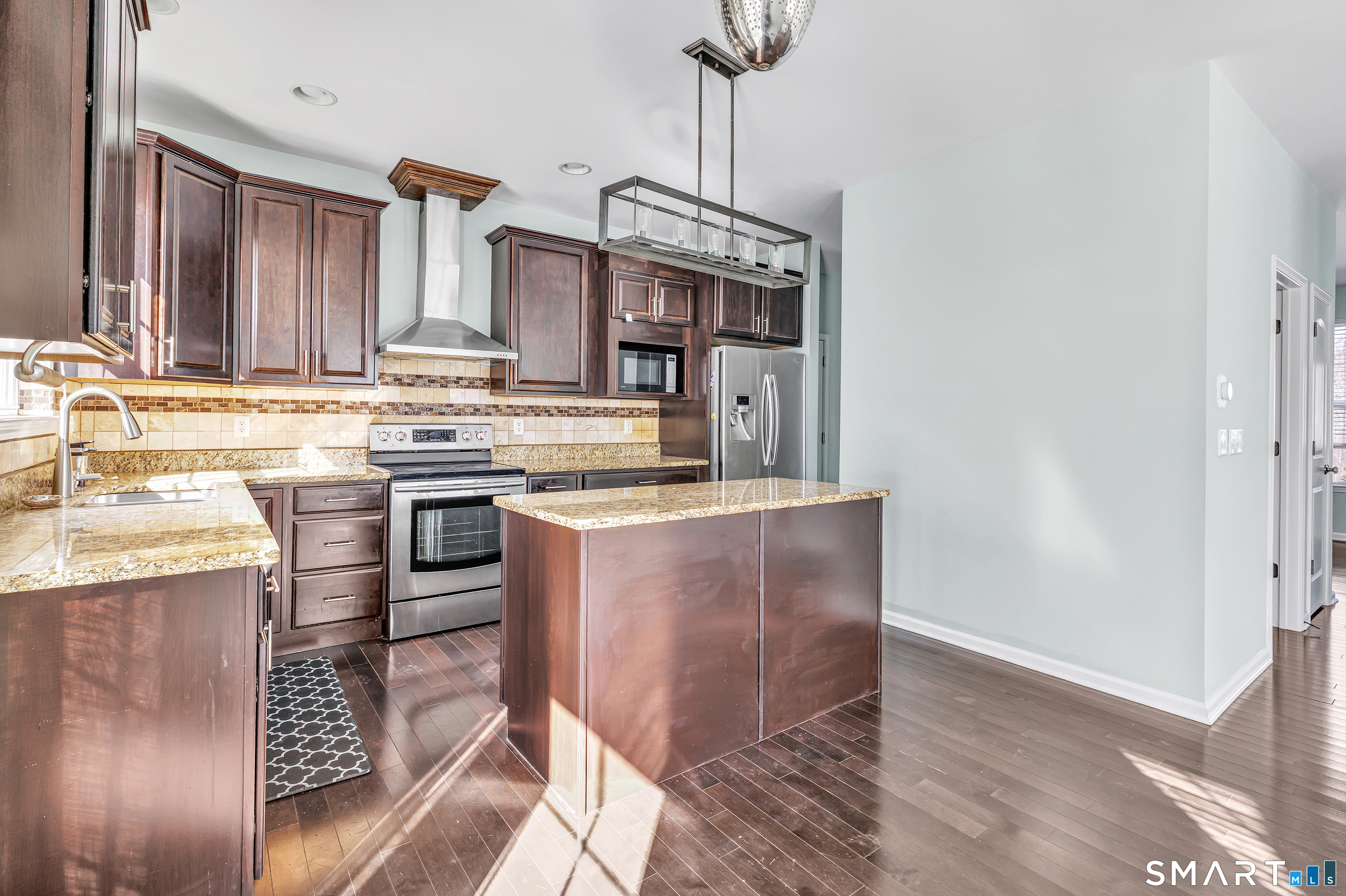 9 Fox Run Lane Seymour, CT 06483 - Photo 6 of 39 a kitchen with stainless steel appliances granite countertop a sink stove and refrigerator