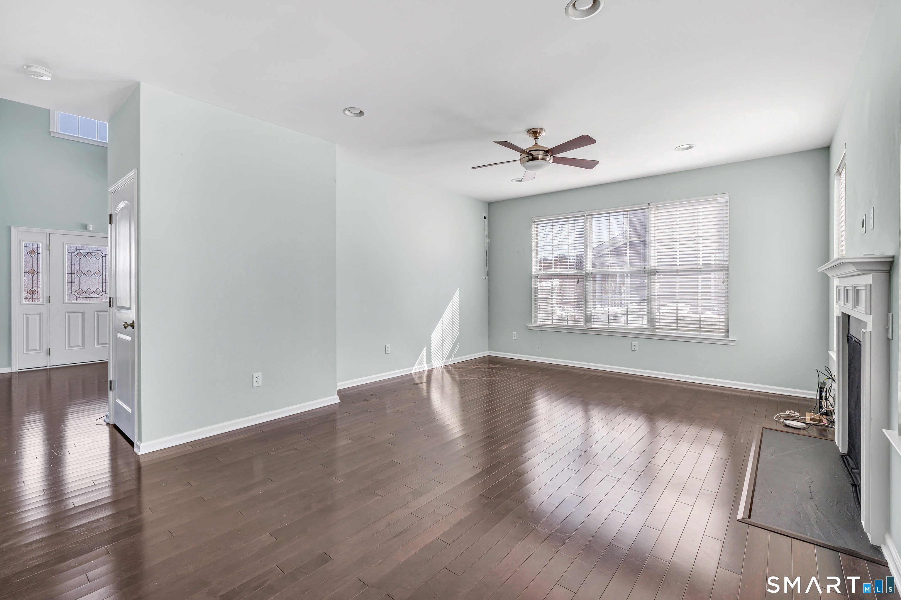 9 Fox Run Lane Seymour, CT 06483 - Photo 8 of 39 wooden floor in an empty room with a window