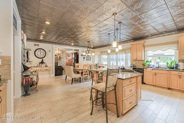 a bathroom with a sink a mirror and a shower