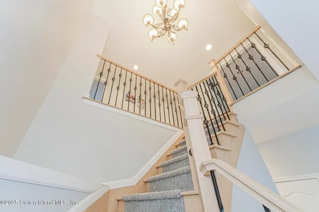 a bed room with a bed and a window