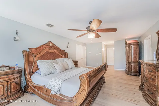a bathroom with a sink a mirror and a shower