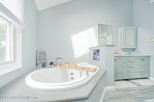 a kitchen with stainless steel appliances granite countertop a refrigerator sink and cabinets