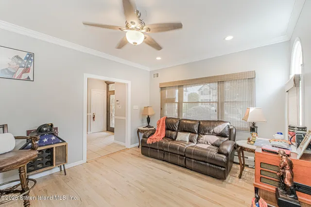 a bathroom with a granite countertop toilet sink and a mirror