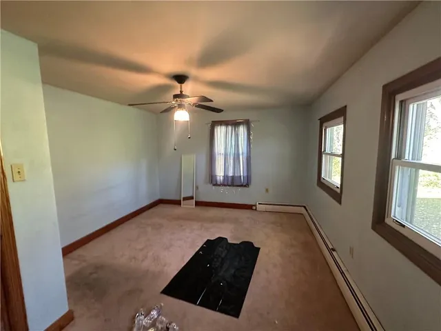 a view of an empty room and window