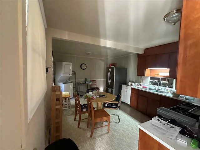 a room with furniture and a flat screen tv