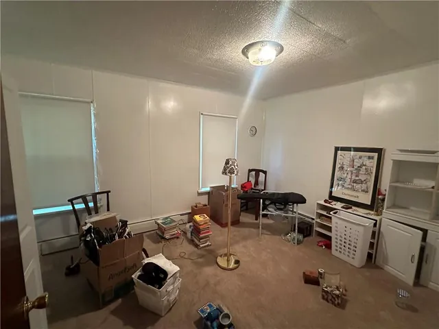 a room with furniture and a wooden floor