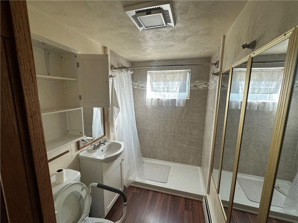 905 Terrace Drive Latrobe, PA 15650 - Photo 9 of 13 a bathroom with a sink and a mirror