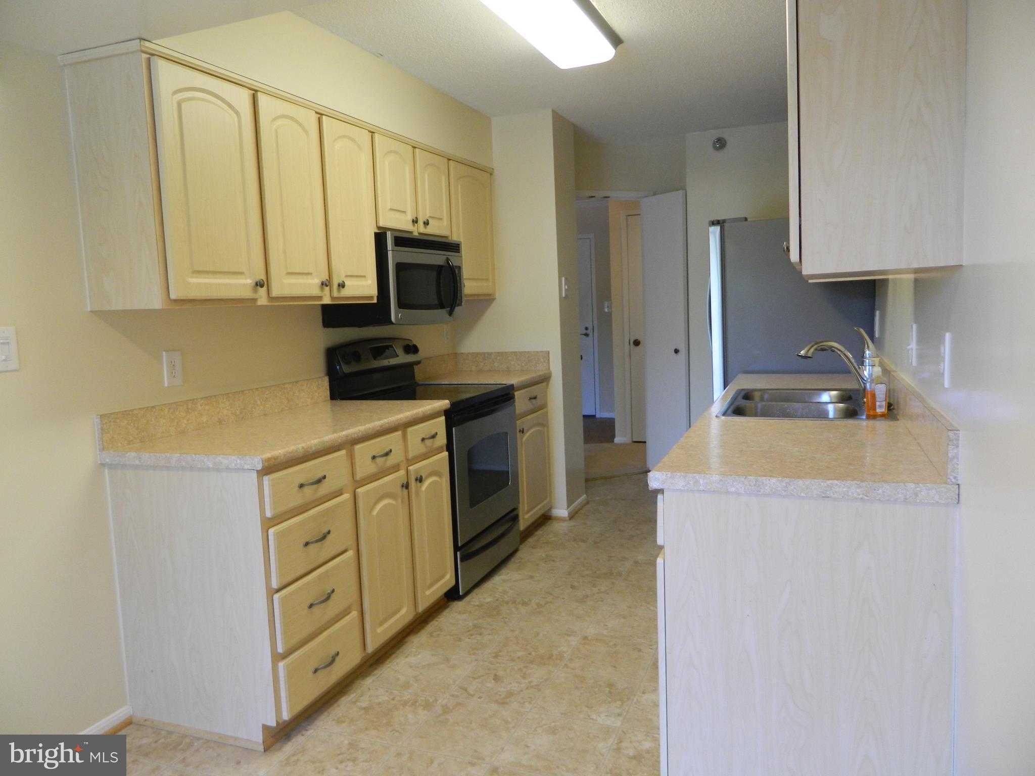 15100 Interlachen Drive, Unit 4521 Silver Spring, MD 20906 - Photo 14 of 27 Stainless Steel Oven Range with Built-in Microwave