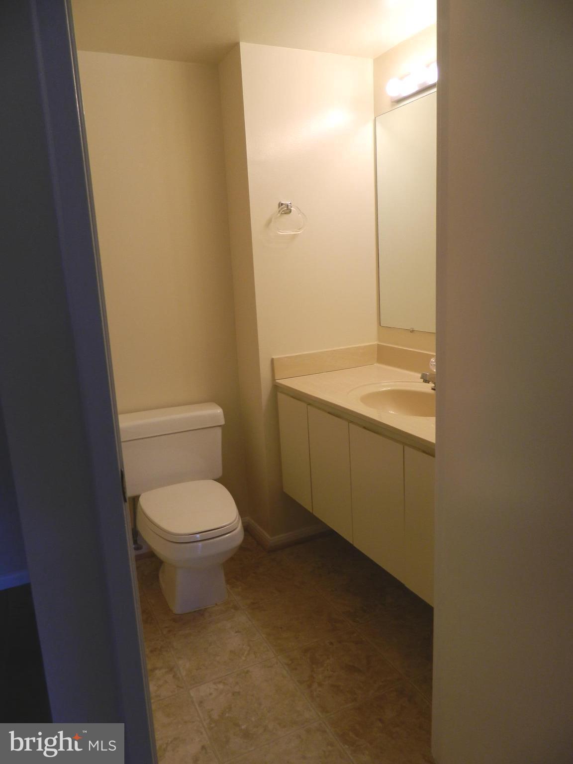 15100 Interlachen Drive, Unit 4521 Silver Spring, MD 20906 - Photo 5 of 27 Powder Room off of Entry