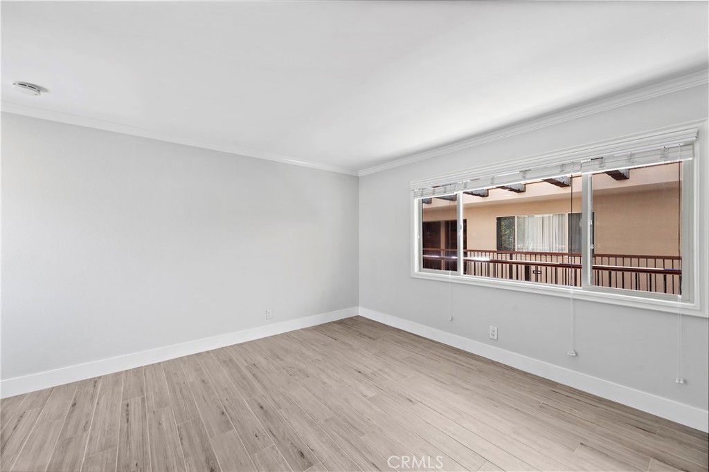 2037 South Coast Highway, Unit 11 Laguna Beach, CA 92651 - Photo 13 of 32 a view of an empty room with a window