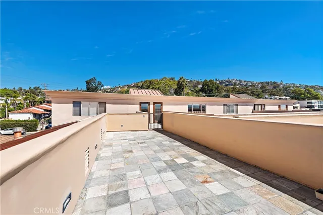 a view of entryway with wooden floor and stairs