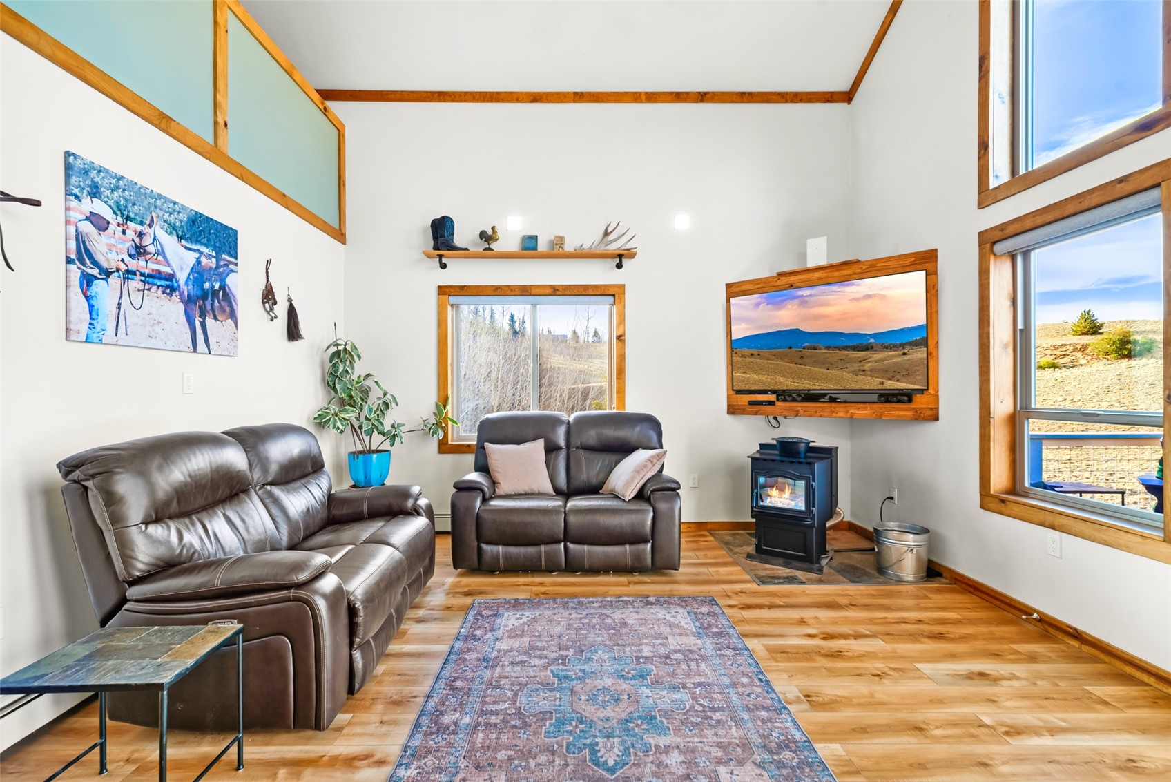 440 Arland Road Como, CO 80432 - Photo 2 of 49 a living room with furniture a rug and a flat screen tv