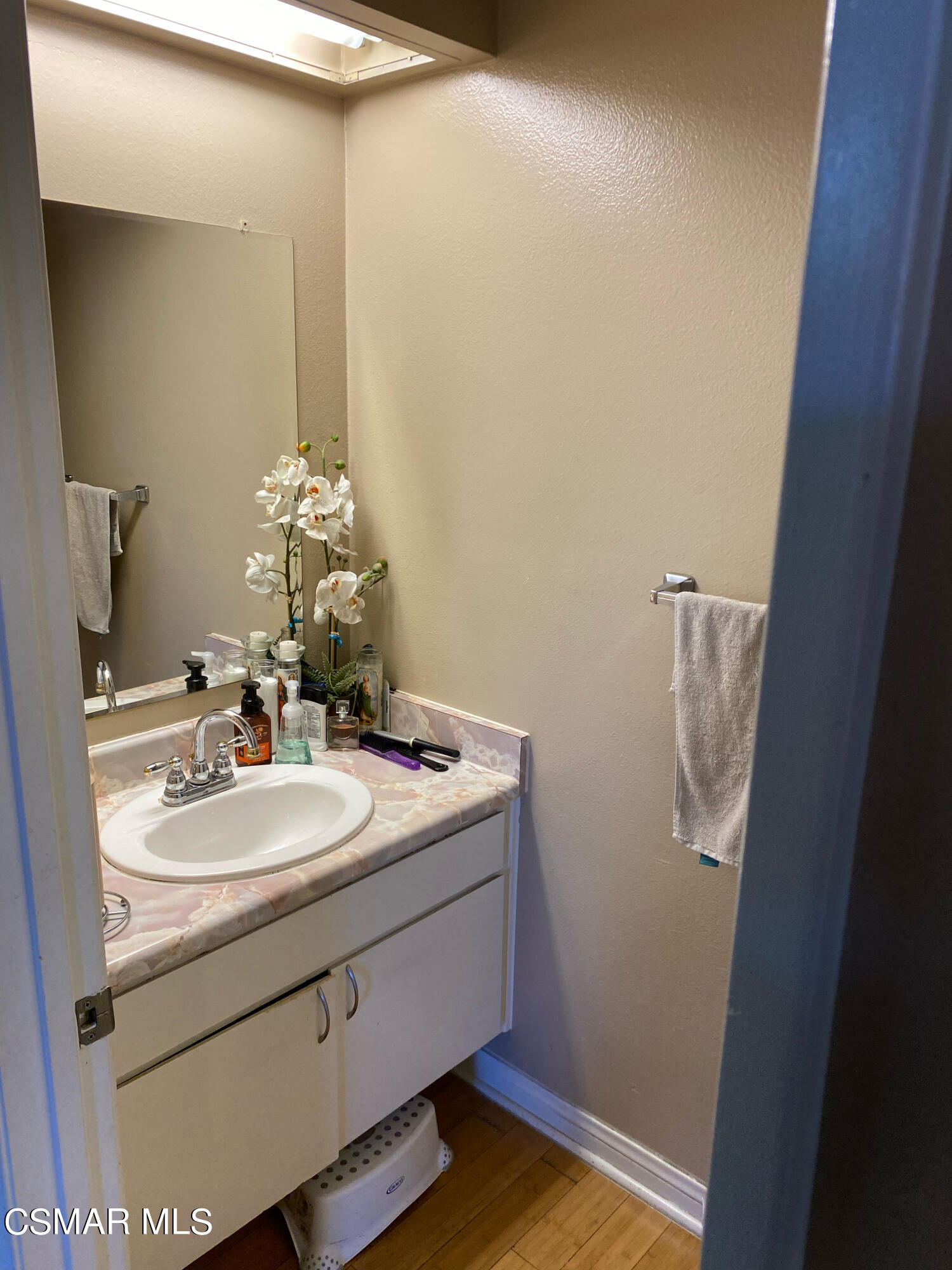 5111 Perkins Road, Unit 4 Oxnard, CA 93033 - Photo 5 of 17 a bathroom with a sink and a mirror