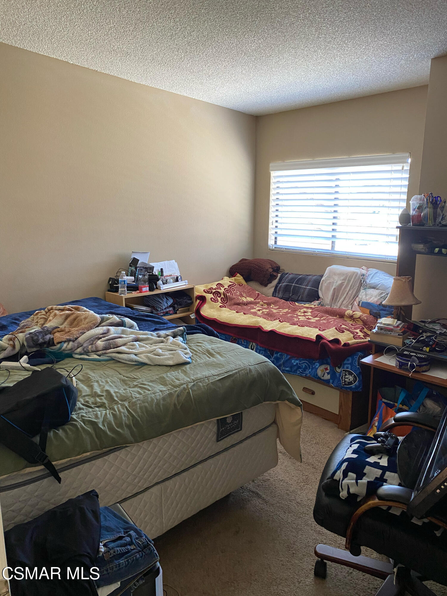 5111 Perkins Road, Unit 4 Oxnard, CA 93033 - Photo 8 of 17 a bedroom with a bed and a window