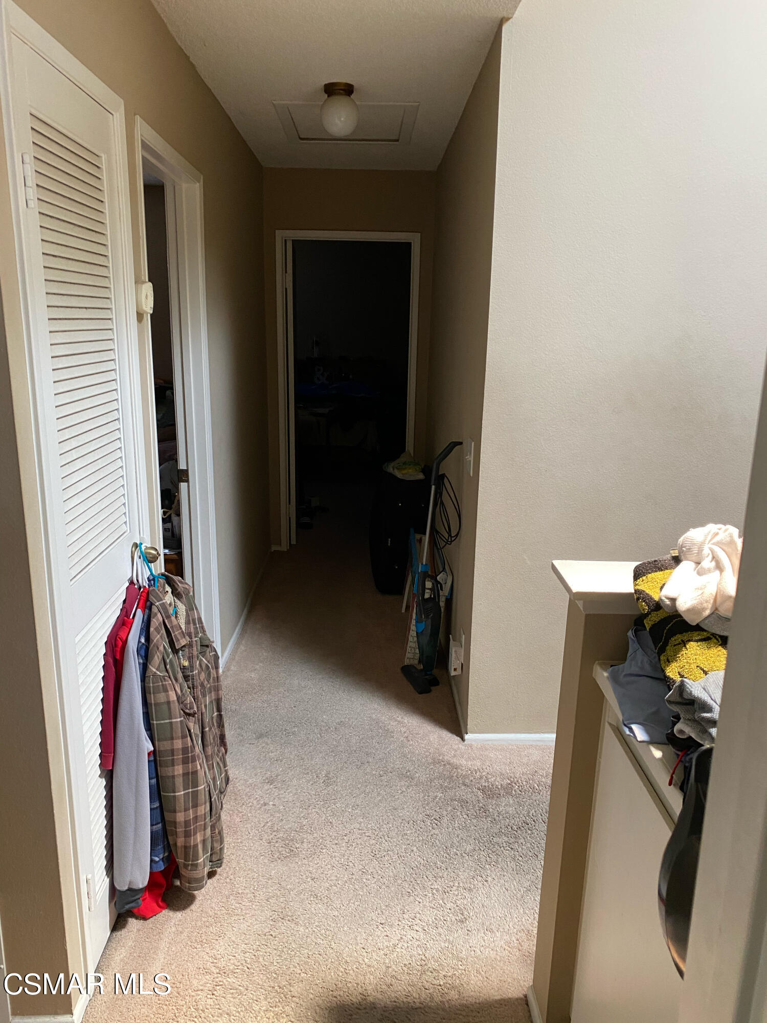 5111 Perkins Road, Unit 4 Oxnard, CA 93033 - Photo 9 of 17 a view of walk in closet with clothes and shoes