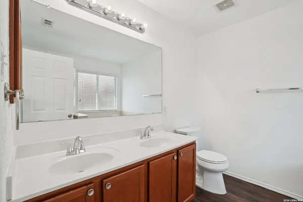 a bathroom with a sink and a toilet