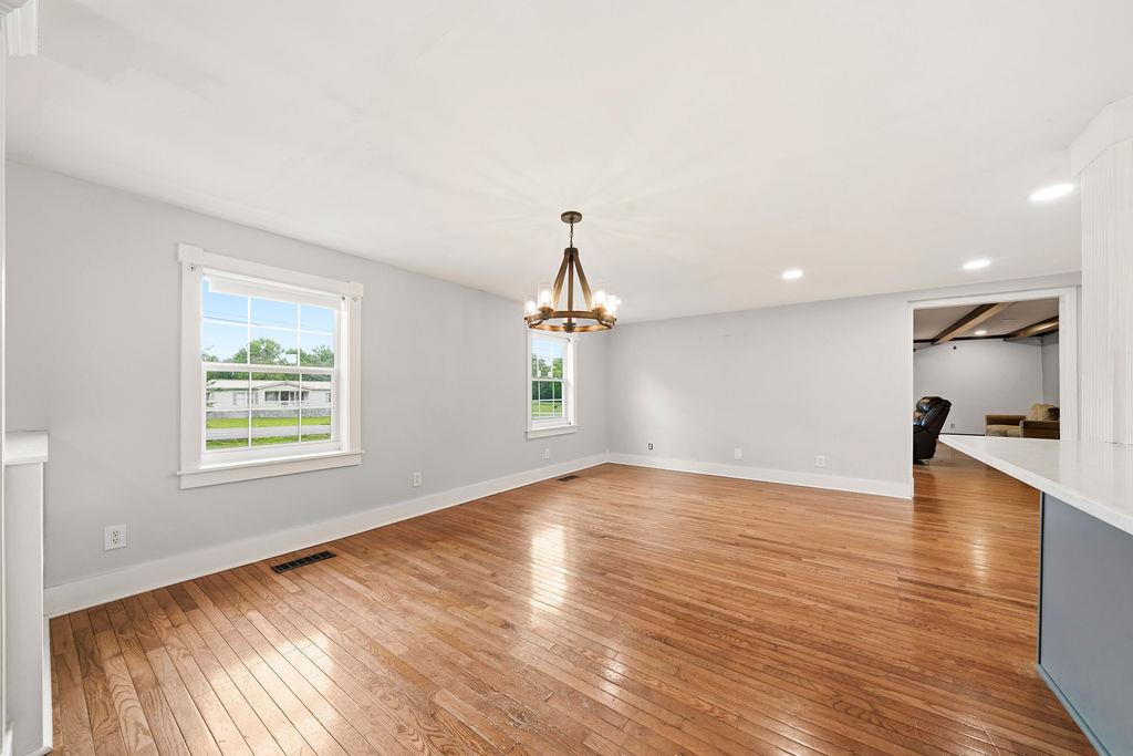 483 Allgood Road Flintstone, GA 30725 - Photo 5 of 34 wooden floor in an empty room with a window