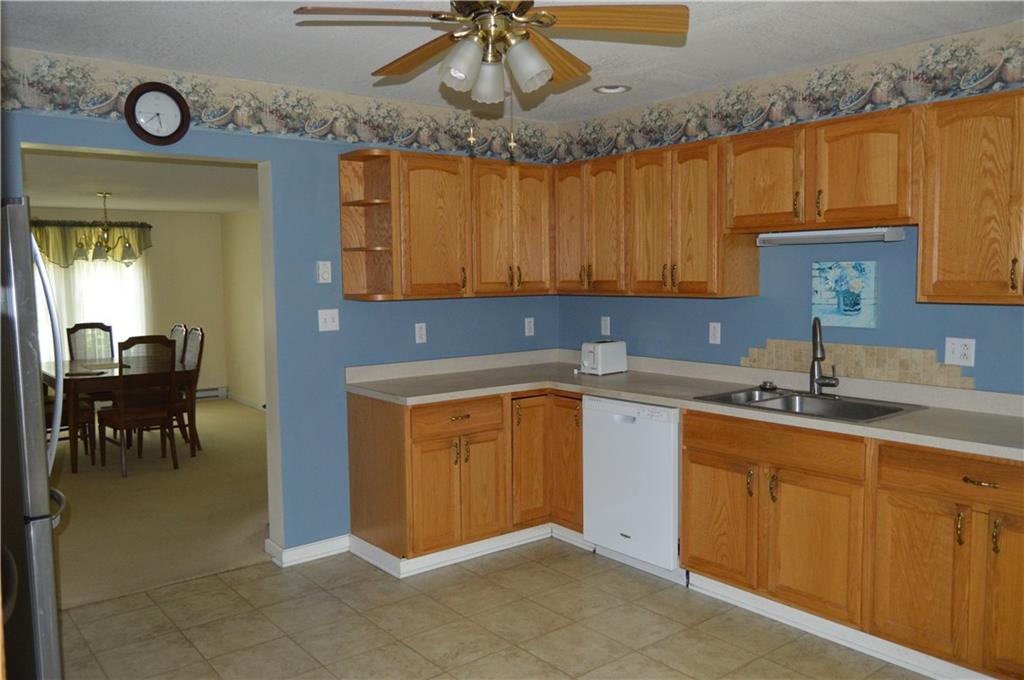 3244 Maple Lane Jamestown, PA 16134 - Photo 7 of 27 a kitchen with a sink and cabinets