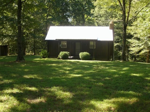 1498 North White Oak Road, Unit 4 Waverly, TN 37185 - Photo 1 of 9 Front view of hunting cabin on property.