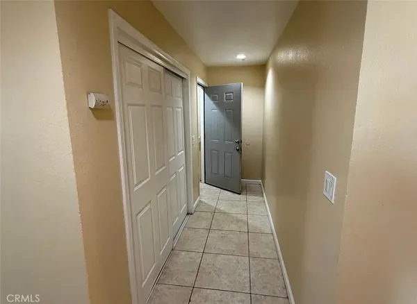 a bathroom with a shower and a sink