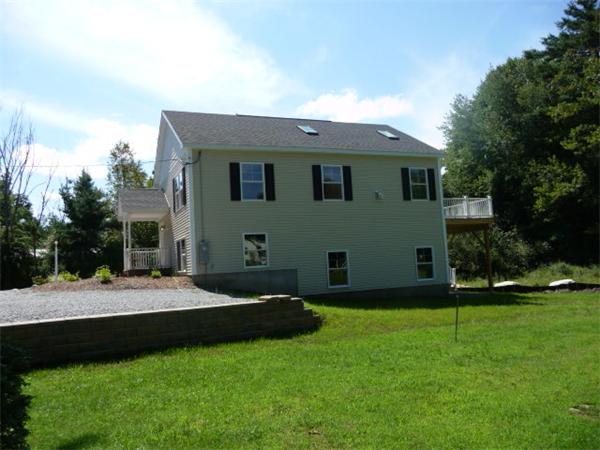 a front view of house with yard
