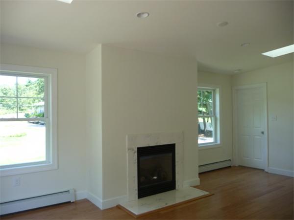 60 A Nashua Road Pepperell, MA 01463 - Photo 3 of 16 an empty room with windows and closet