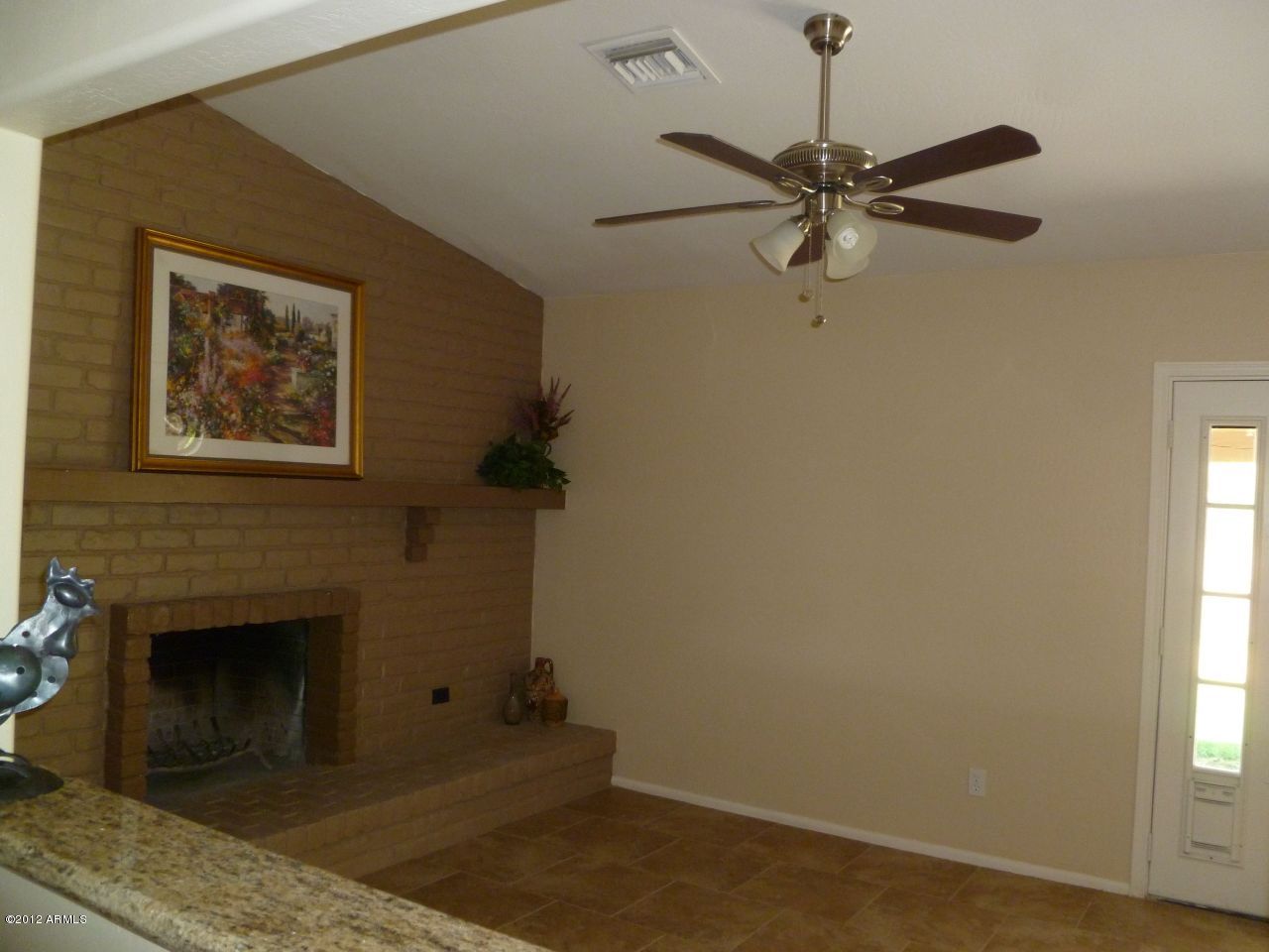 125 West Wagoner Road Phoenix, AZ 85023 - Photo 7 of 24 living room - from kitchen