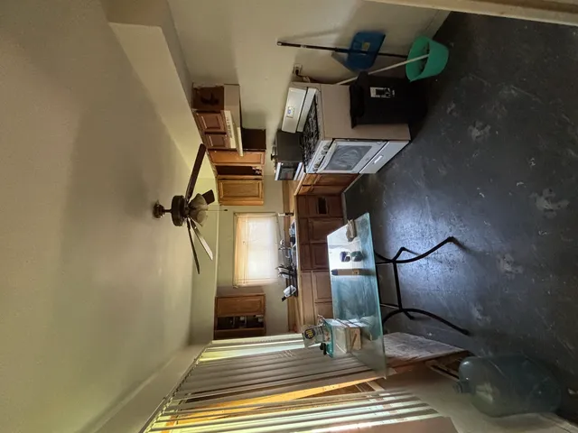 a view of a house with backyard and garden