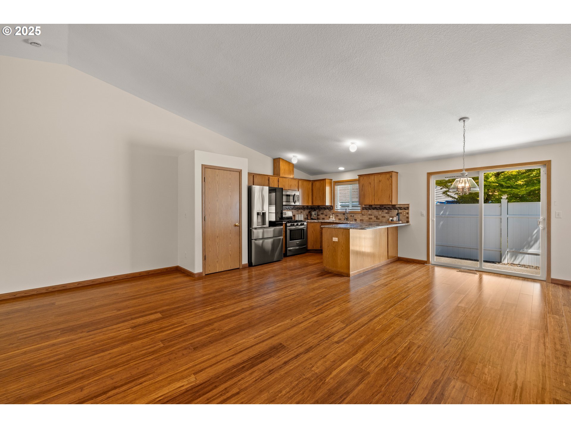 11592 Parrish Road Oregon City, OR 97045 - Photo 5 of 26 a view of kitchen with wooden floor
