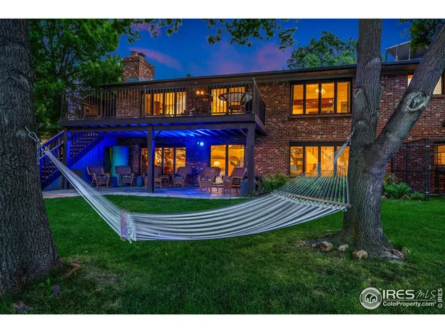 a view of a house with a big yard
