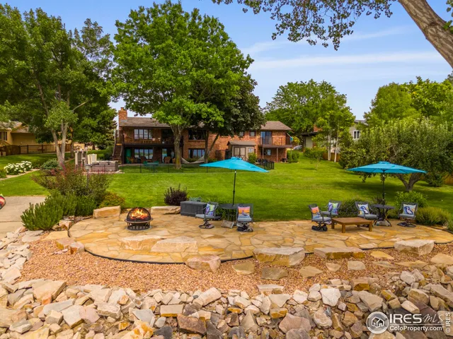 an outdoor space with patio and a garden