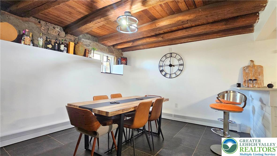 2239 Wassergass Road Hellertown, PA 18055 - Photo 18 of 42 a view of a dining room with furniture and a chandelier